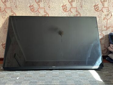 Телевизоры: Телевизор Grundig, крупная диагональ (около 60–65"). Производство —
