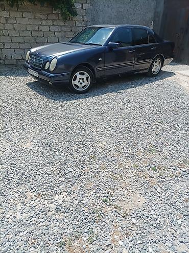 w210 duman: Mercedes-Benz E-Class: 2.3 l | 1996 il Sedan — 1