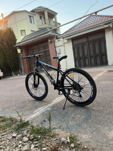 Velosiped ehtiyyat hissələri: SPORT-TIME markasına aid qara rəngli dağ velosipedi. Velosipeddə disk