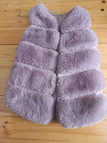 Uşaq üçün tüklü jiletka – açıq bənövşəyi/çəhrayı tonlarda. - Model lalafo.az -da Uşaq üçün tüklü jiletka – açıq bənövşəyi/çəhrayı tonlarda. - Model