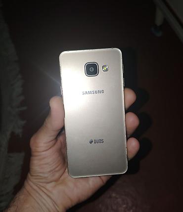 nokia 215 4g: Samsung Galaxy A3, rəng - Qızılı, İki sim kartlı — 1