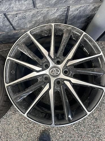 124 e500: Комплект из 4 оригинальных литых дисков Toyota с шинами. - Диаметр — 2
