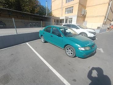 mbe group: Mazda 323: 1998 г., 1.5 л, Механика, Бензин, Седан — 4