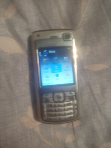 sadə nokia telefonları: Nokia N70 sadece korpusu kohnelib amma cat siniq yoxdur telefon