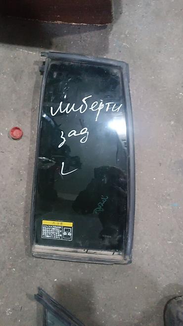 d 110: Стекло Багажника Nissan, 1998 г., Б/у, Оригинал — 9