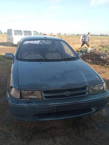 российские машины: Toyota Corsa: 1994 г., 1.3 л, Автомат, Бензин, Седан — 1