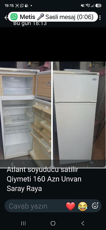 Atlant markalı ikiqat qapılı soyuducu. Üst kamera dondurucu, alt hissə