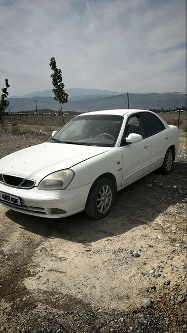 шыны 12: Daewoo Nubira: 2000 г., 1.6 л, Механика, Бензин, Седан