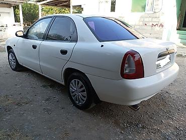Daewoo: Daewoo Nubira sedan - Kuzov: 4 qapılı sedan, ağ rəng - Ban dizaynı — 2