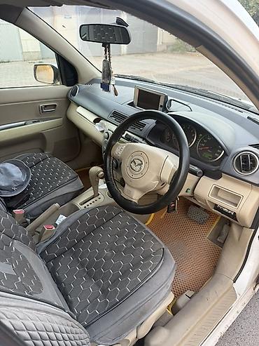 chek it: Mazda Demio: 2003 г., Автомат, Бензин, Хэтчбэк — 3