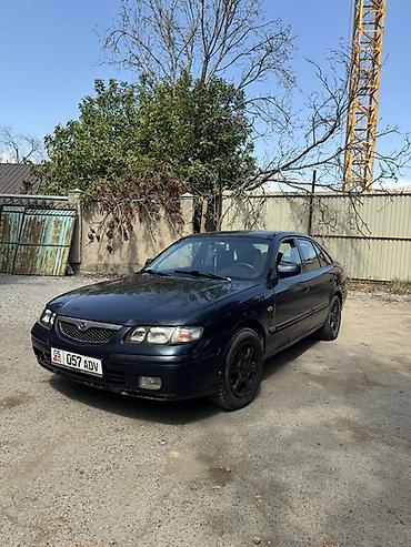 зеркела: Mazda 626: 1997 г., 1.8 л, Кол менен иштөөчү, Седан — 1