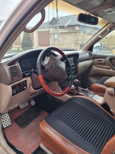 Toyota: Toyota Land Cruiser (100 seriyası) – ağ rəngdə, tam ölçülü 7 yerlik — 14