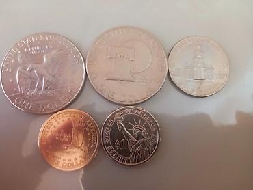 Sikkələr: ABŞ xatirə sikkələri dəsti Tərkib: - 2 ədəd Eisenhower One Dollar — 5