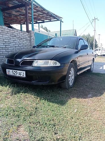 suzuki ignis запчасти: Mitsubishi Carisma: 2002 г., Механика, Бензин, Седан — 1