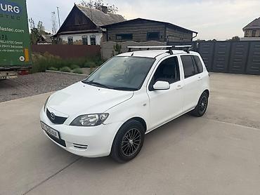 Mazda Demio: 2003 г., 1.3 л, Автомат, Бензин, Хэтчбэк