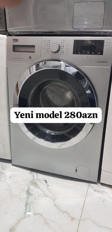 Paltaryuyan maşınlar: Beko önyükləməli paltaryuyan maşın - Gümüşü korpus, iri xrom qapı -