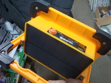 солнечные прожекторы: Солнечные прожекторы,50ват, Ещё заряжать от сети, аккумулятор 5400Ма