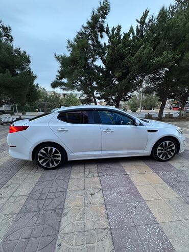 Информатика: Kia Optima: 2 л | 2014 г. Седан