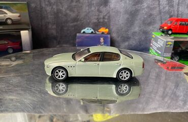 Avtomobil modelləri: Коллекционная модель Maserati Quattroporte V light green 2005 — 2