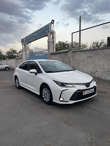corolla 2022: Toyota Corolla: 2022 г., 1.8 л, Автомат, Гибрид, Седан — 1