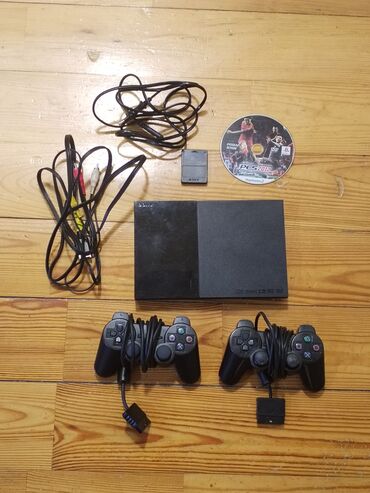 vector robot baku: Playstation 2 slim tam islek veziyyetdedir hec bir problemi yoxdur
