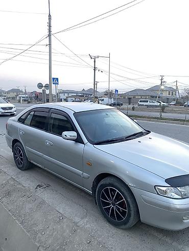 mini coper: Mazda 626: 1999 г., 1.8 л, Механика, Бензин, Седан — 3
