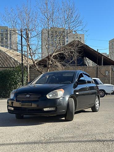 Hyundai: Hyundai Accent sedan – qara rəng Xüsusiyyətlər: - Kuzov: 4 qapılı — 3