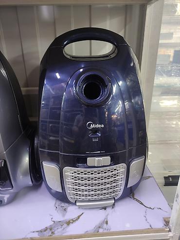 coffee maker: Пылесос Midea (мешковый) - Компактный корпус с удобной верхней ручкой — 1