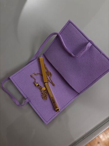 tək qaş üzük qiymətləri: Qızılı rəngdə sep - Qablaşdırma: “Jumla” yazılı, bənövşəyi rəngdə