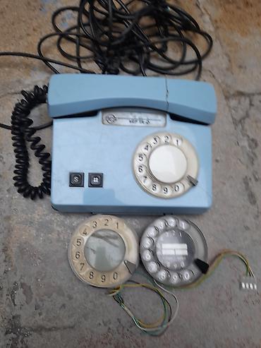 simli: Məhsul: Mexaniki diskli masa telefonu və əlavə disk mexanizmləri — 1