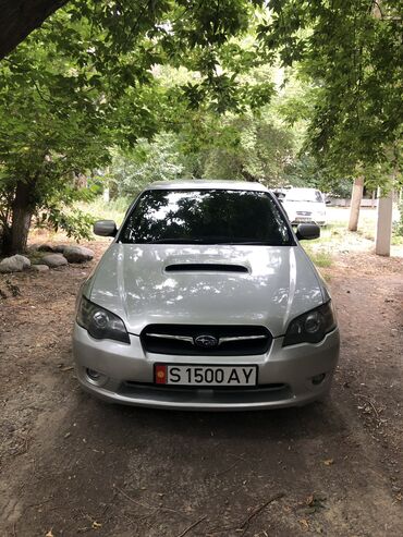 обе стороны: Subaru Legacy: 2005 г., 2 л, Автомат, Бензин, Седан