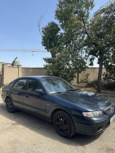 зеркела: Mazda 626: 1997 г., 1.8 л, Кол менен иштөөчү, Седан — 2