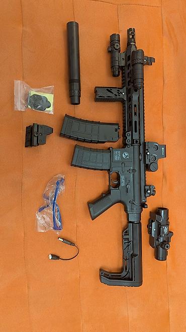 миша: Продам орбизный автомат AR-15 с цевьем SLR. Есть два магазина, два — 2