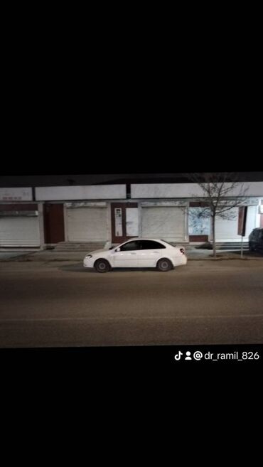 Daewoo: Daewoo Gentra: 1.5 л | 2014 г. Седан