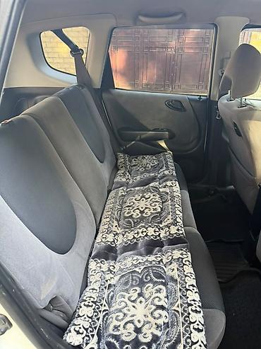 аито: Honda Fit: 2001 г., 1.3 л, Вариатор, Бензин, Универсал — 9