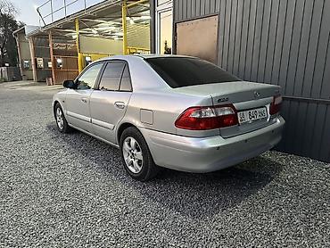 стекол: Mazda 626: 2000 г., 2 л, Автомат, Газ, Седан — 4