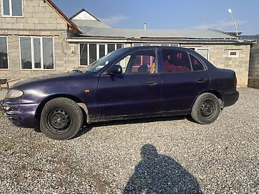 Другие автомобили: Седан компакт-класса, 4 двери, темно-фиолетовый цвет. Кузов с — 4