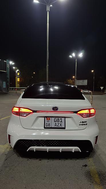 покрышки на 12: Toyota Corolla: 2022 г., 1.8 л, Гибрид, Седан — 4