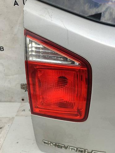 2014: Фонарь крышки багажника Chevrolet Orlando 2014 лев. (б/у) — 1