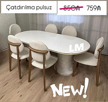 stolllar: - Yemək dəsti: 1 ədəd oval stol + 6 ədəd stul - Stol: parlaq ağ oval — 1
