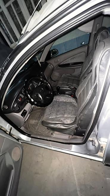 унаа тетиктери: Nissan Almera: 2000 г., 1.8 л, Кол менен иштөөчү, Бензин, Седан — 2