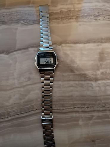 budilnik saat: Casio metalik seliqeli saatdi. Az islenib ela veziyyetdedi. ekran — 2