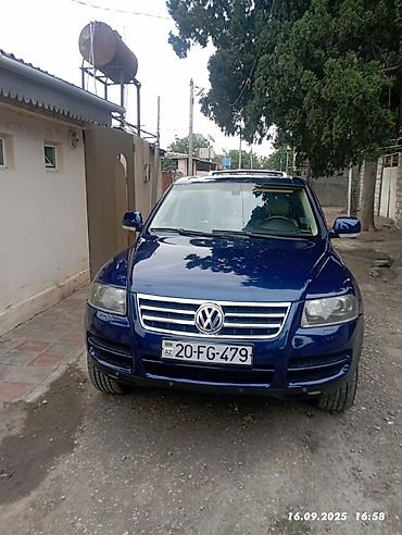 011 sekilleri: Volkswagen Touareg: 3.2 l | 2006 il Universal — 1