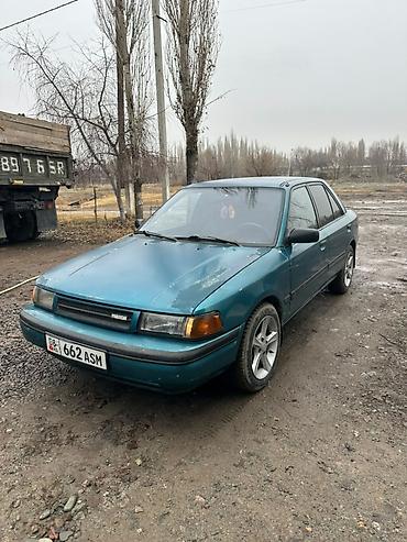 Mazda 323: 1994 г., 1.8 л, Механика, Бензин, Седан — 3