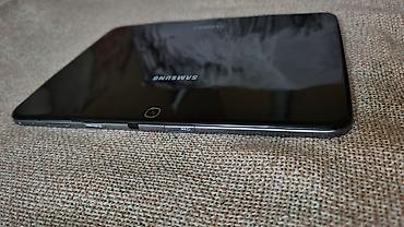 Tableti: Samsung Galaxy Tab (serija Tab 4/Tab E izgled) – 10.1" Android tablet — 13