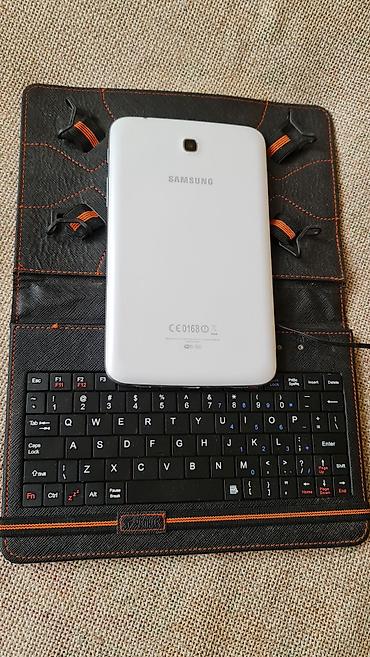 iphone tablet: Kožna futrola sa ugrađenom žičnom tastaturom za tablet (oko 7–8 inča) — 8