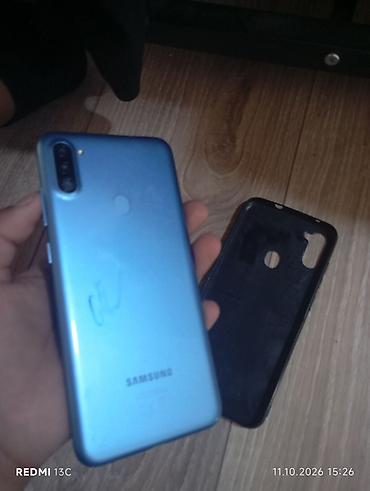 Мобильные телефоны: Смартфон Samsung Galaxy A11 (синий) с чехлом - Экран 6.4" Infinity-O — 3
