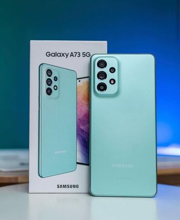 самсунг 65: Samsung Galaxy A73, 128 ГБ, цвет - Голубой, 1 SIM