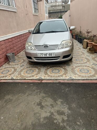 Toyota Corolla: 1.4 л | 2006 г. Седан