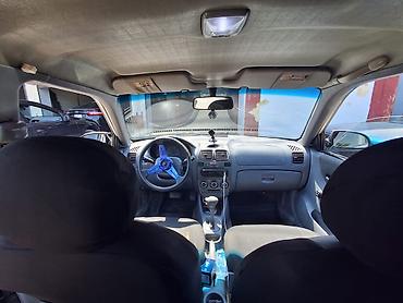 kia clarus 1997: Hyundai Accent: 1.5 l | Sedan — 6